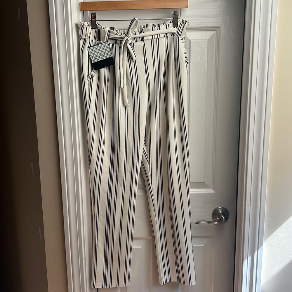 Black pinstriped capri length dress pants
